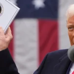 Trump with book of trade