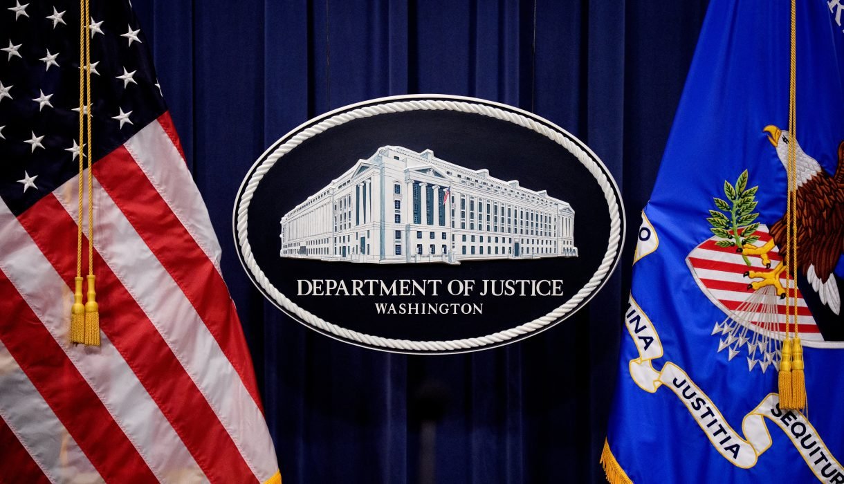 DOJ and USA flags